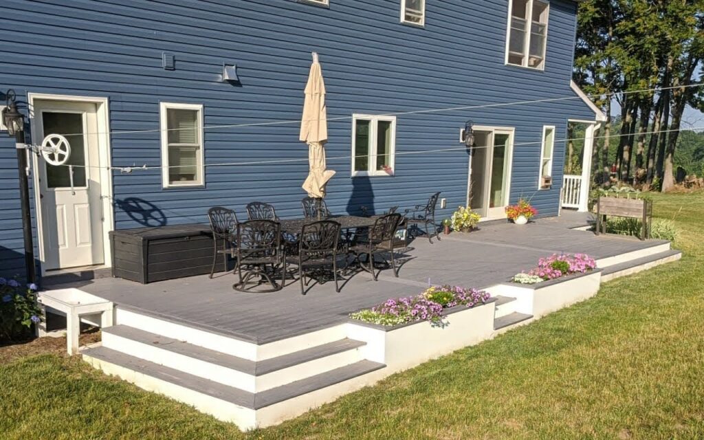 Deck With Flower Bed In Ephrata, Pa 6 Side View Of Composite Backyard Deck