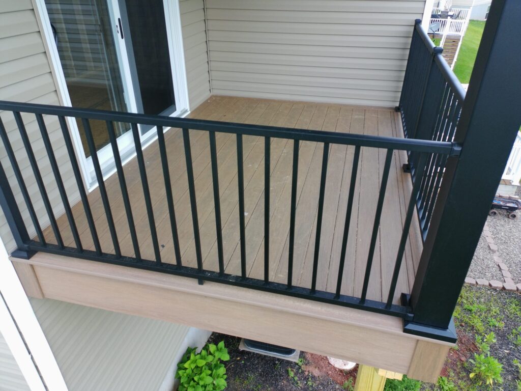 Second Floor Deck Building In Denver, Pa 6 Composite Decking With Black Aluminum Railings